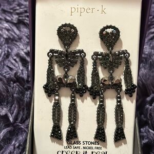 piper k skeleton earrings